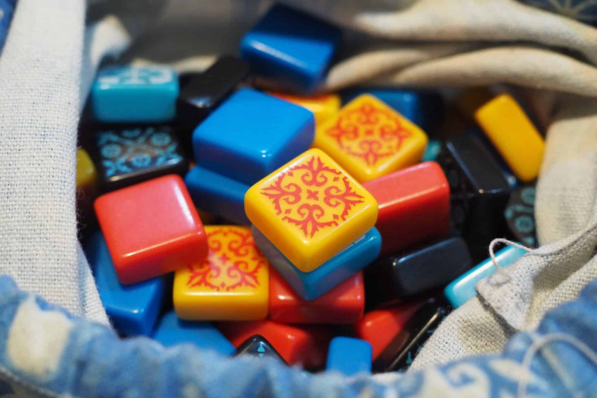 A Stack of Azul Blocks in Blue Bag